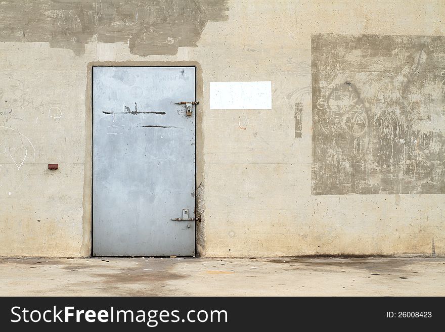 Concrete Wall With Metal Door