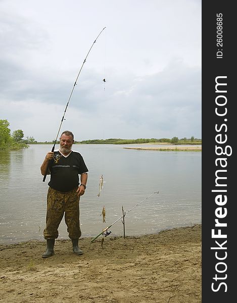 Fisherman On The River