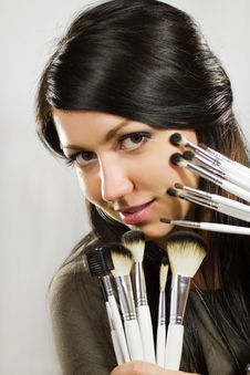Beautiful Woman With Makeup Brushes Royalty Free Stock Photography Beautiful Woman With Makeup Brushes Royalty Free Stock Photography