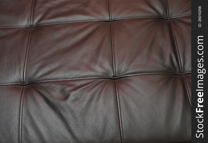 Detail of the sample coated with leather sofas in the living room. Detail of the sample coated with leather sofas in the living room.