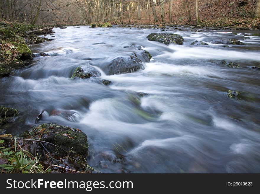 River flowing through the valley for a long time. River flowing through the valley for a long time