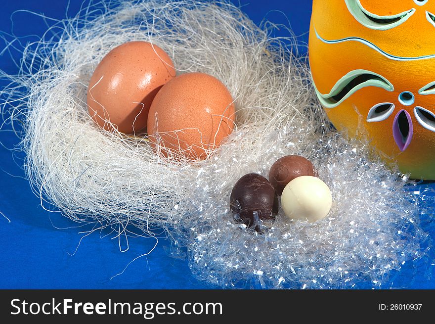 Easter eggs laid on white straw