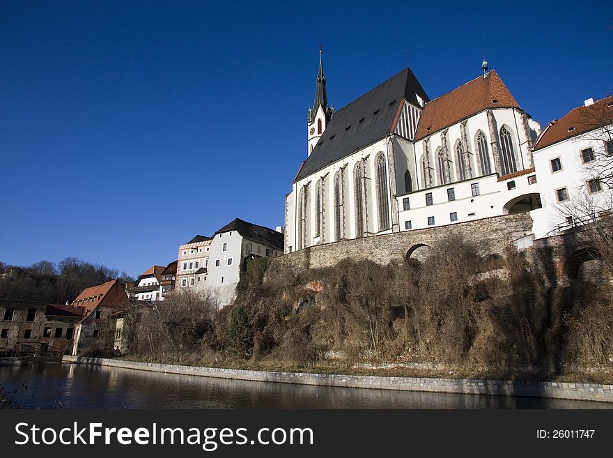 Church in czech krumlov and blue sky