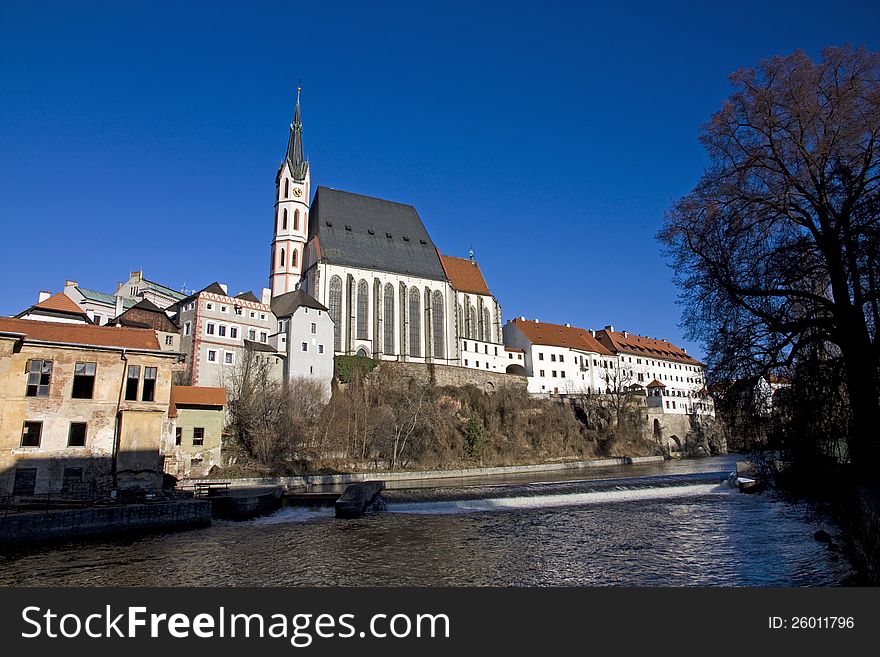 Church in czech krumlov and blue sky