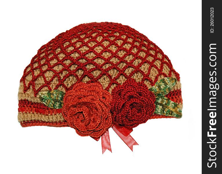 Women's knitted hat handmade with flowers rose. Women's knitted hat handmade with flowers rose