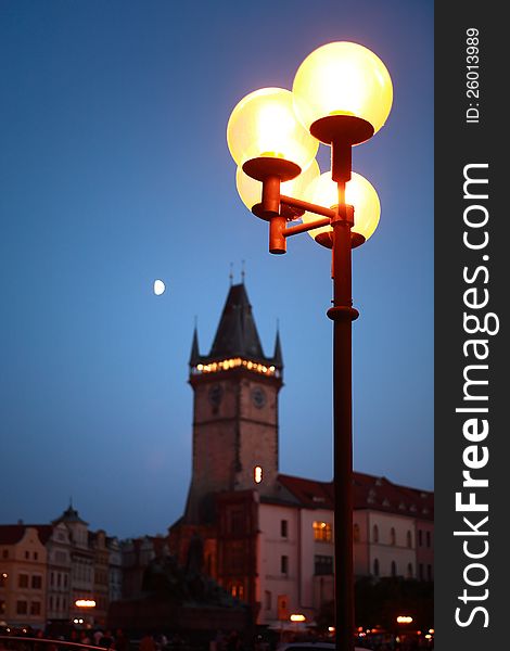 Luminous street lamp on background with Town Hall Tower,Prague,Czech Republic. Luminous street lamp on background with Town Hall Tower,Prague,Czech Republic