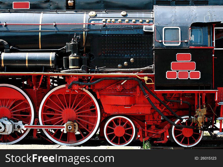 Detail of a vintage steam powered locomotive. Detail of a vintage steam powered locomotive