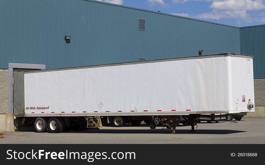 A trailer at a loading dock. A trailer at a loading dock