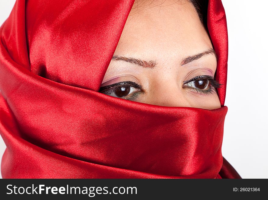 Portrait of a middle eastern woman wearing red traditional clothing. Portrait of a middle eastern woman wearing red traditional clothing