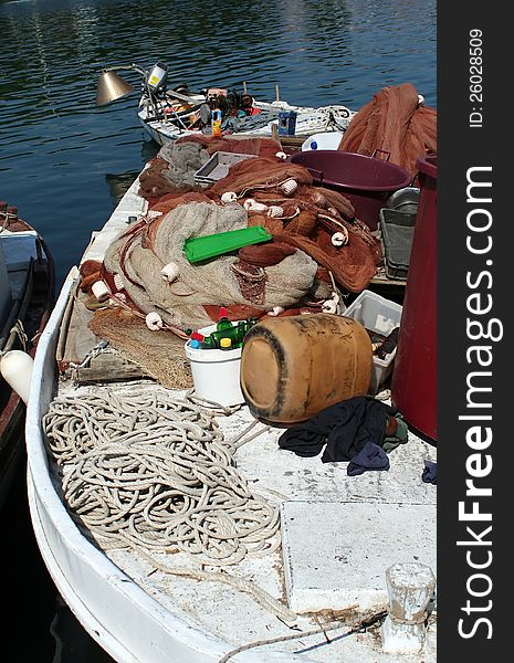 A messy fishing boat with equipments