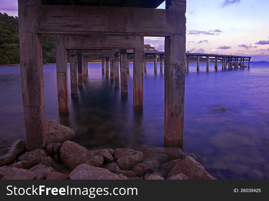 Wooden bridge across to the resort in Rayong, Thailand. Wooden bridge across to the resort in Rayong, Thailand.