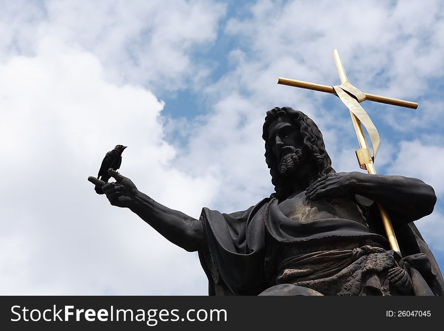 Saint John The Baptist statue with bird sitting on his hand. Saint John The Baptist statue with bird sitting on his hand