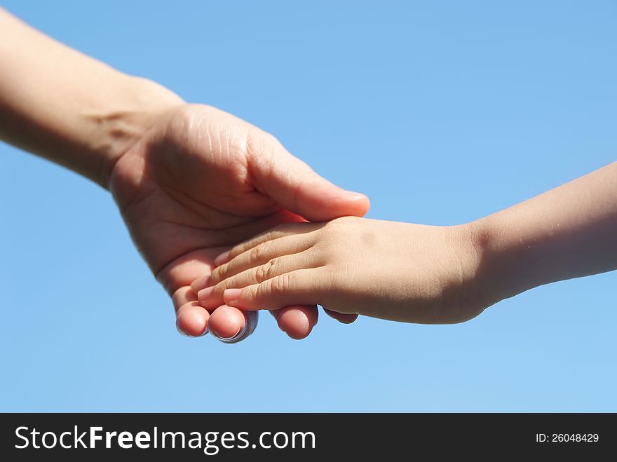 A mother giving a daugther a helping hand.