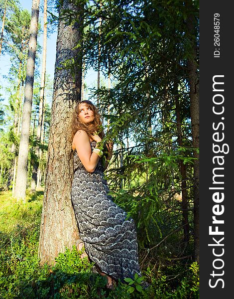 Girl With Long Hair In Forest