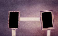 Two Frames Hanging On A Wooden Chair Royalty Free Stock Photos