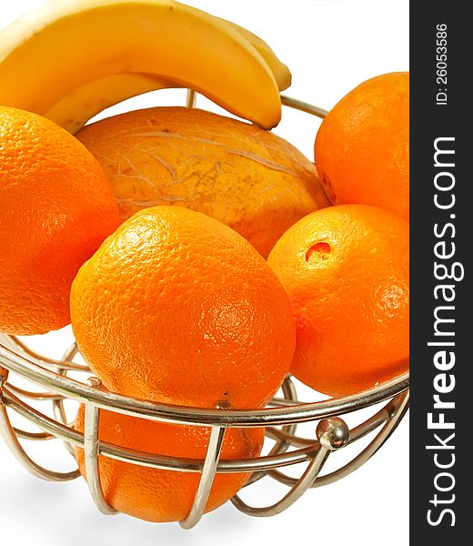 Metal  basket with orange fruits isolated on a white background