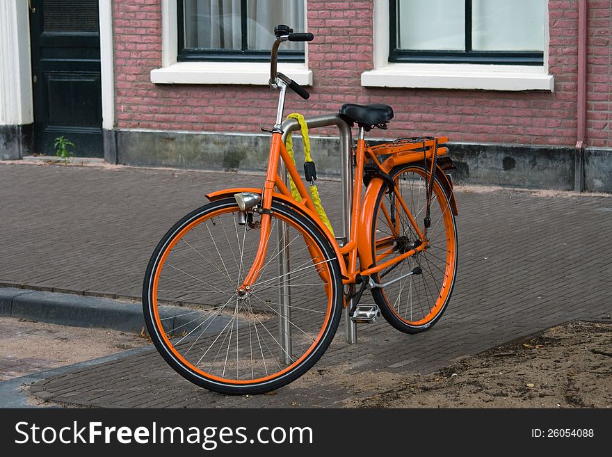 Typical dutch bike in the city of Amsterdam. Typical dutch bike in the city of Amsterdam.