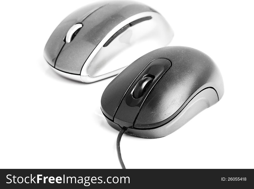 Two computer mice over white (with shadow). Two computer mice over white (with shadow)
