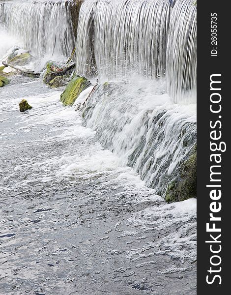 Water flowing over rocks.  Closeup.