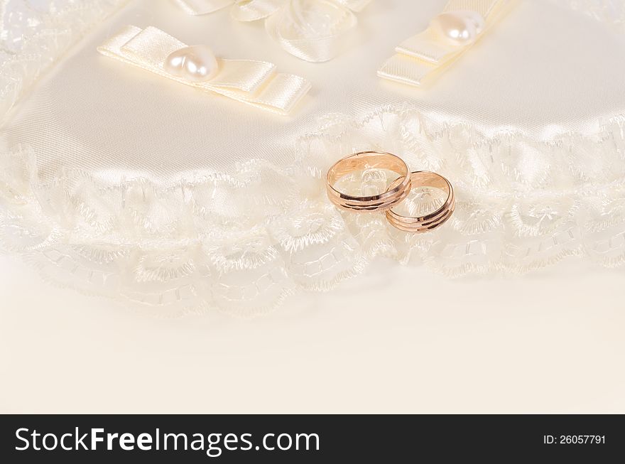 Two golden wedding rings. Wedding background