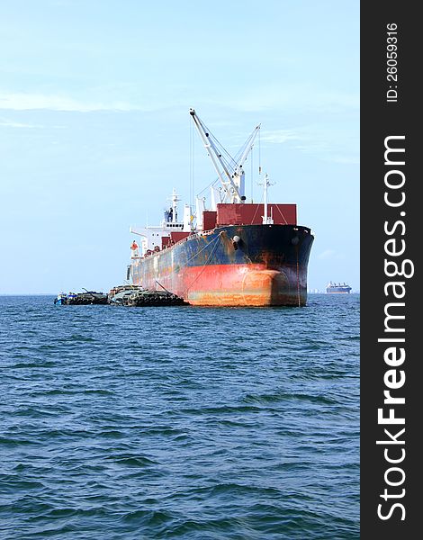 A Large cargo ship anchored offshore thailand