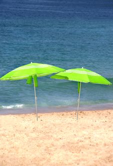 Two Green Sun Umbrellas On The Beach Royalty Free Stock Photo Two Green Sun Umbrellas On The Beach Royalty Free Stock Photo
