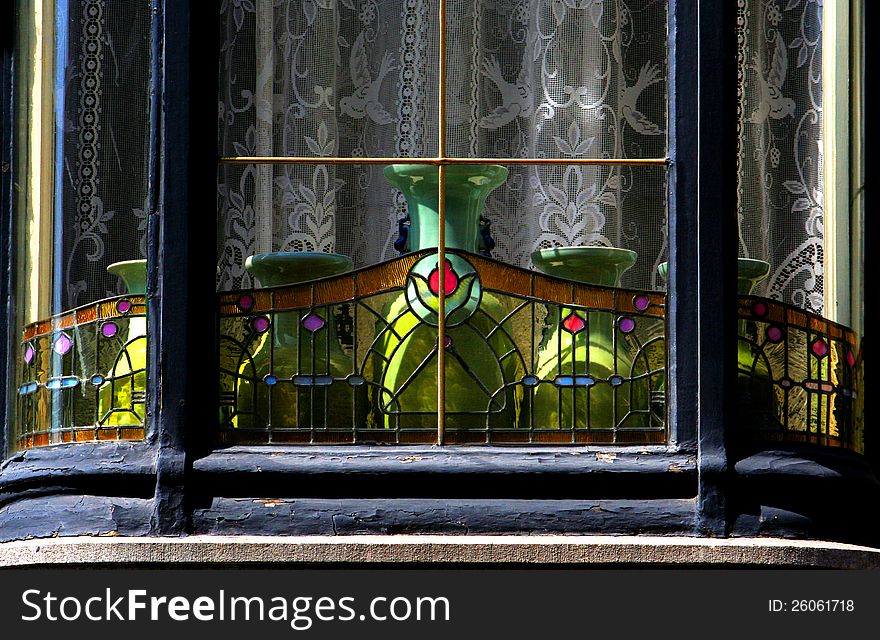 art nouveau bay window with colourful stained glass