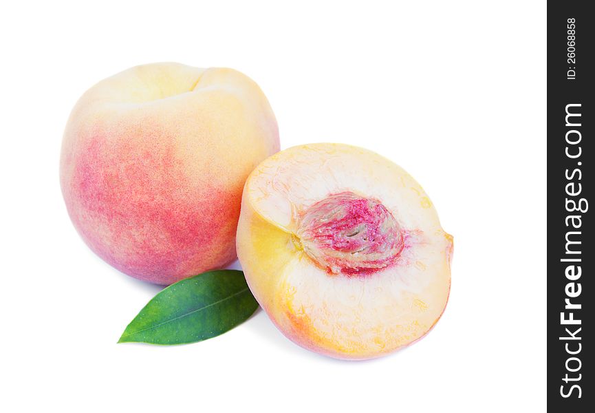 Tasty juicy peaches on a white background