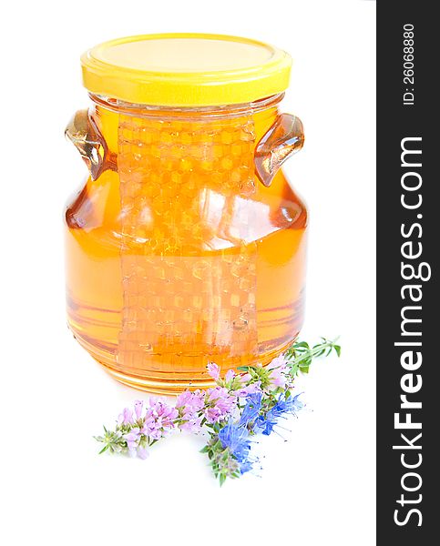 Jar Of Golden Light Honey on a white background