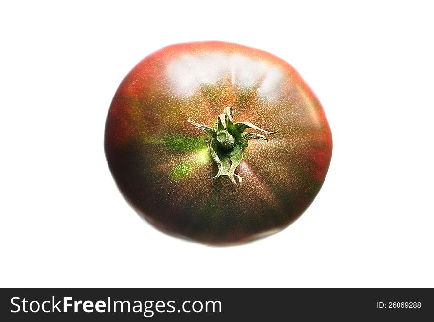 Top view of black krim heirloom tomato isolated on white