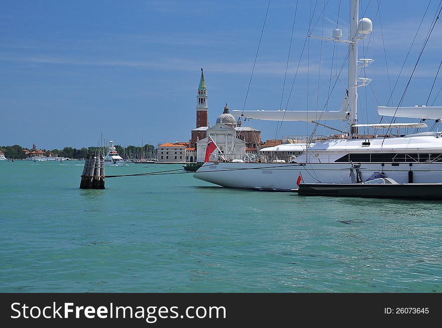 Sailing boat in front of the San Giorgio church, Giudecca canal, Venezia, Italy. Sailing boat in front of the San Giorgio church, Giudecca canal, Venezia, Italy