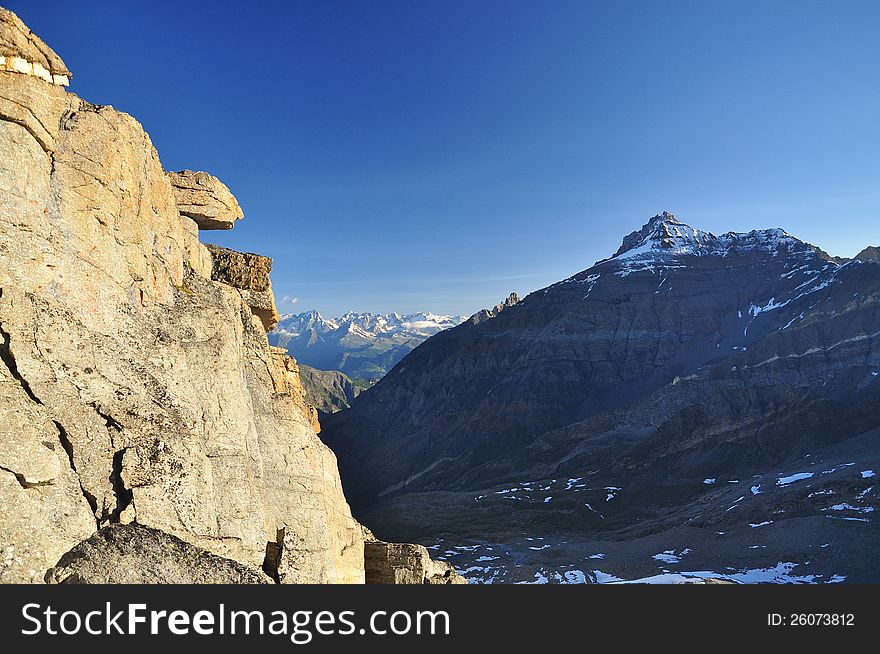 Sunrise light on the Gran Paradiso national park peaks. Aosta Valley, Italy. Sunrise light on the Gran Paradiso national park peaks. Aosta Valley, Italy