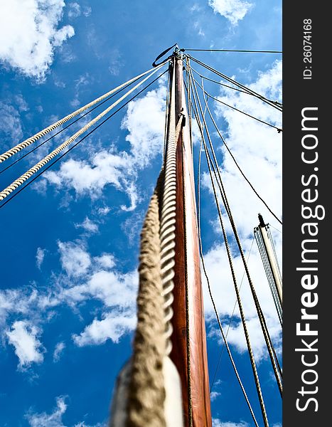 Looking up an old wooden boat mast