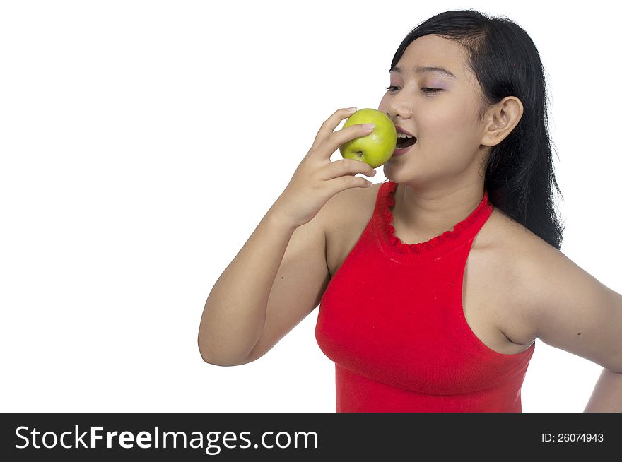 Fat asian woman eat green apple isolated over white background. Fat asian woman eat green apple isolated over white background