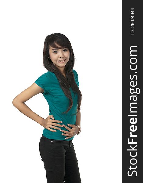 Asian woman in green shirt, posing isolated over white background