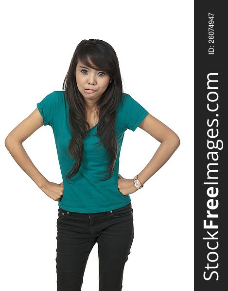 Asian woman in green shirt, posing isolated over white background