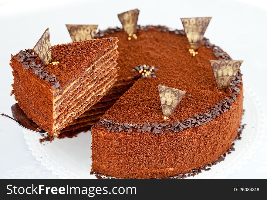Brown chocolate cake on table. Brown chocolate cake on table