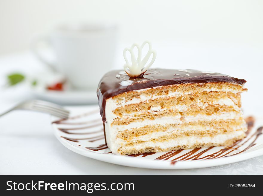 Sweet cake on table with cup of tea. Sweet cake on table with cup of tea