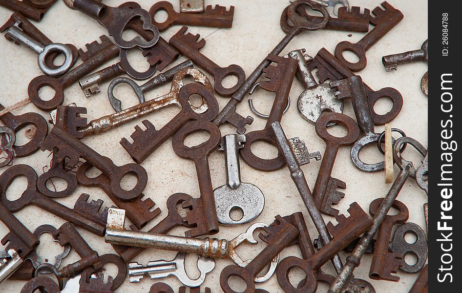 Close-up of different types of old vintage rusty keys. Close-up of different types of old vintage rusty keys