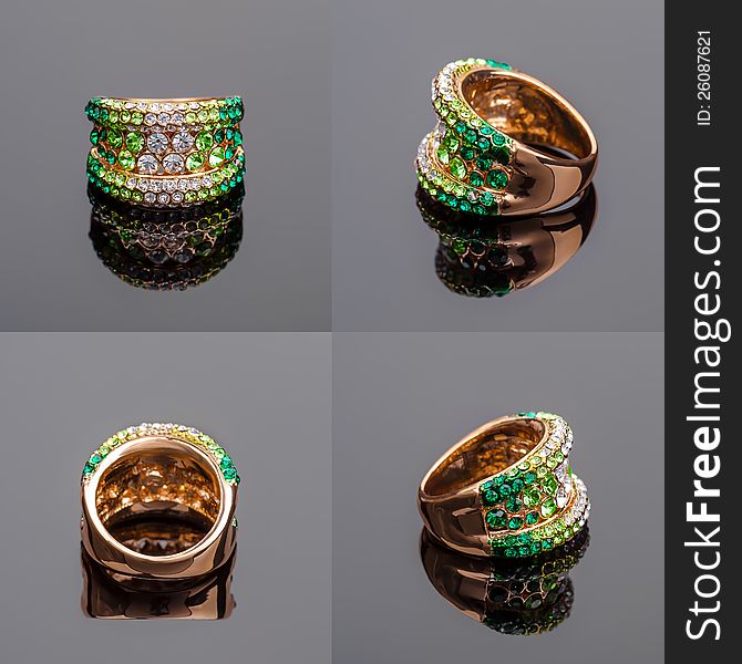 Gold ring with green crystals on all sides. Gold ring with green crystals on all sides