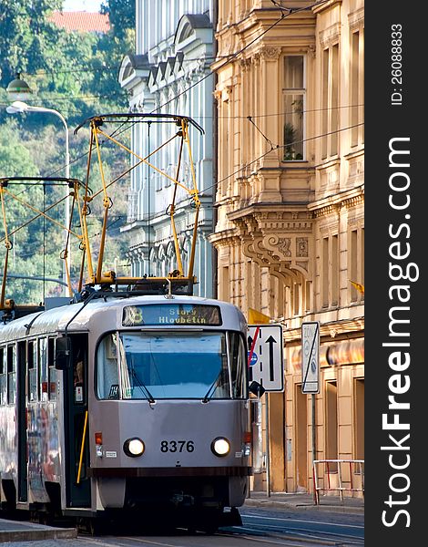 The tram moves on rails down the street Prague. The tram moves on rails down the street Prague