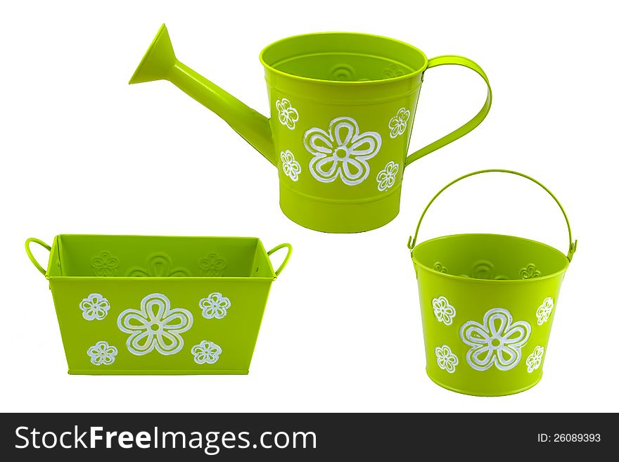 Green watering can, bucket and flowerpot isolated on white. Green watering can, bucket and flowerpot isolated on white