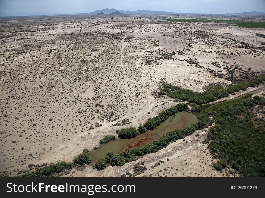 Water hole in the Arizona desert near Casa Grande. Water hole in the Arizona desert near Casa Grande