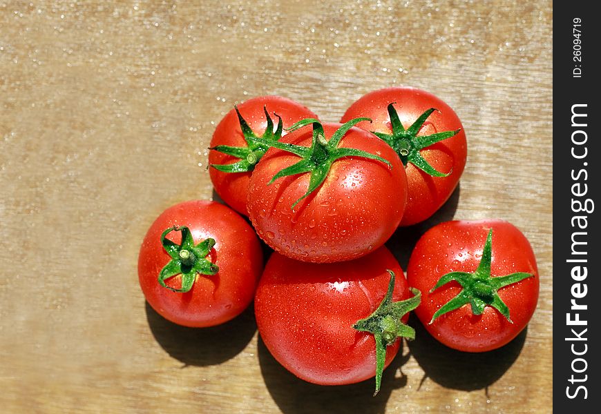 Group of natural tomato with drops of dew