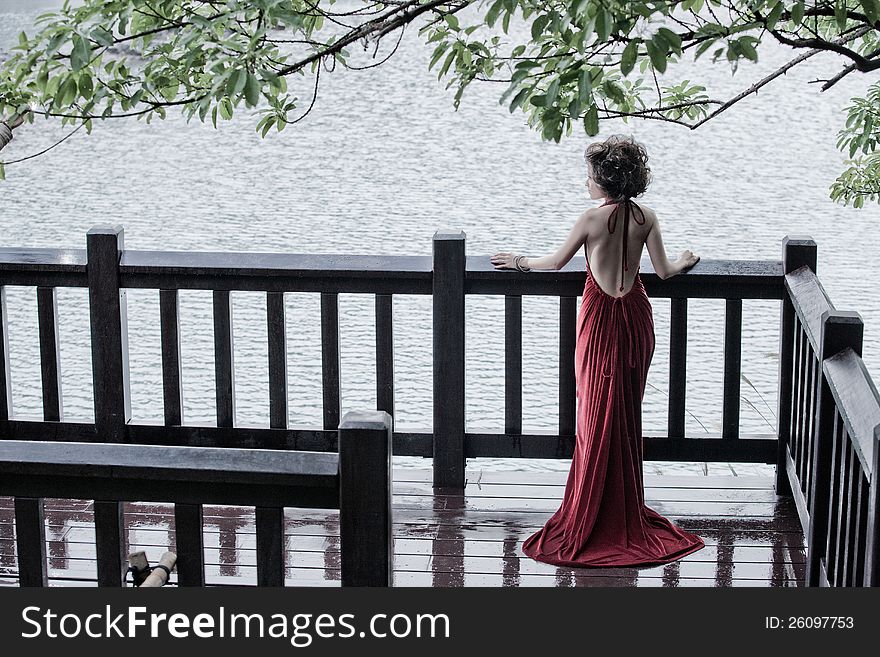 A wedding picture portraits with a red dress