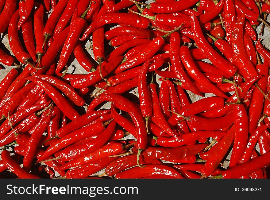 Cayenne chili, spread out in the sun. Cayenne chili, spread out in the sun