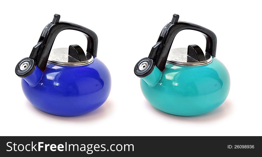 Two blue pitchers, light and dark colored, used for heating water. Two blue pitchers, light and dark colored, used for heating water