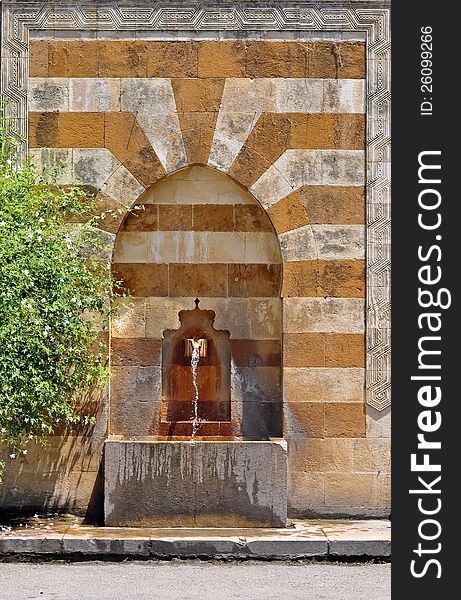 An old water pedestal inspired from Islamic architecture