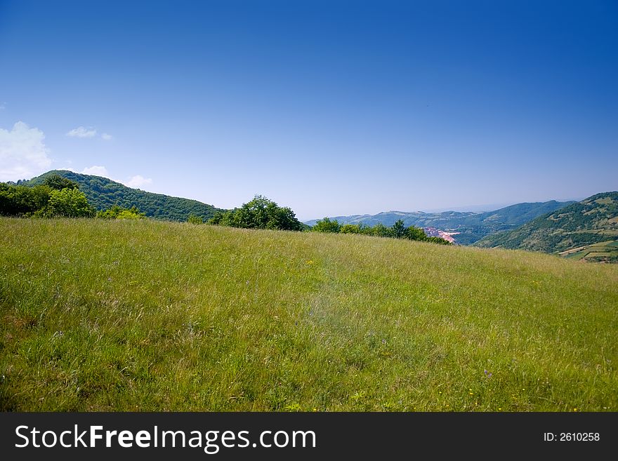 Meadow on a hill and blue sky in spring. Meadow on a hill and blue sky in spring