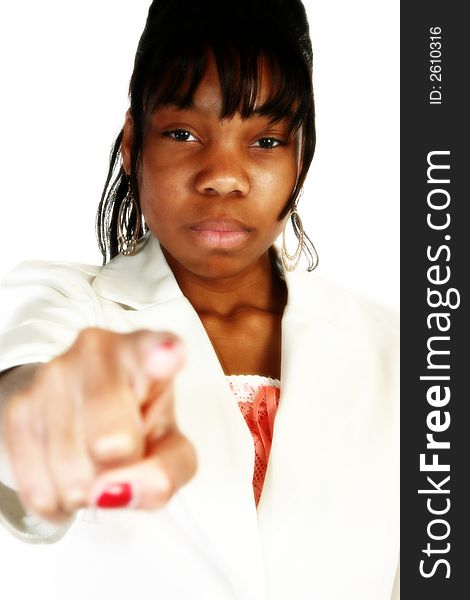 Beautiful African American teen girl pointing, serious expression. Beautiful African American teen girl pointing, serious expression.
